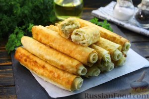Хрустящий перекус перед основным блюдом.
ХРУСТЯЩИЕ РУЛЕТИКИ ИЗ ЛАВАША С НАЧИНКОЙ