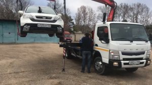 Эвакуатор с КМУ Fuso Canter