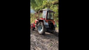 ?Трактор Т-30А80 в гору по грязи после дождя