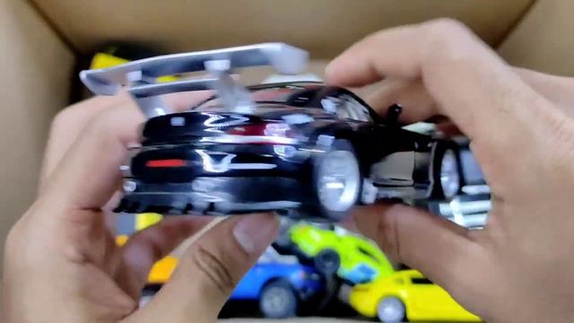 A Box Full Of Cars, Roll Royce, Lamborghini, Porsche, Marcedes, Land Cruiser, McLaren, BMW, Bugatti смотреть онлайн