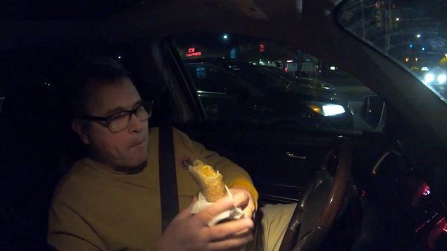 Tasting Riliberto's Bacon Egg & Cheese Burrito, N Oracle Rd, Tucson, Arizona, 20 January, GX038537 смотреть онлайн