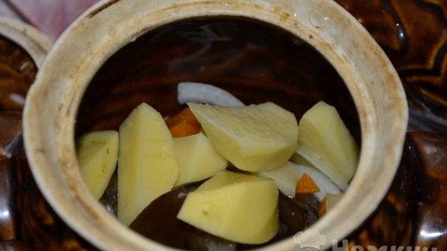 Potatoes With Meat In A Pot