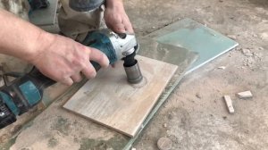 любое отверстие коронкой для ушм в плитке аккумуляторной болгаркой Makita DGA504