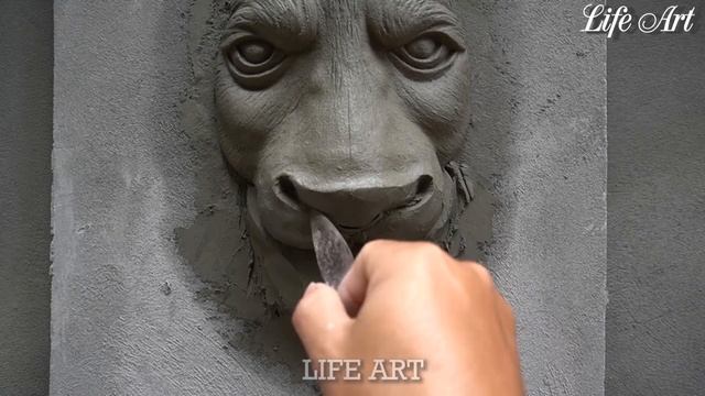 Sculpture of a lion's head with sand cement смотреть онлайн