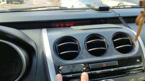 Как настроить часы на Мазде CX7.