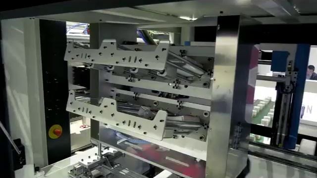Side entry IML system for plastic products смотреть онлайн