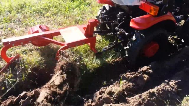 МТЗ 152 с двухкорпусным плугом ПНД-1