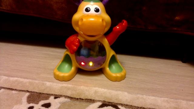 Игрушка Kiddieland "Забавный бегемот с шарами" смотреть онлайн