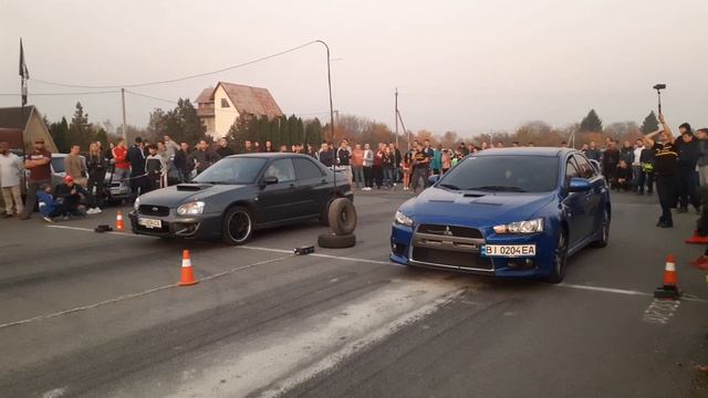 Mitsubishi Lancer Evolution vs Subaru Impreza Wrx Sti смотреть онлайн