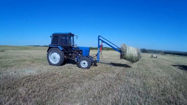 Погрузчик на мТз -82 погрузка рулонов сени