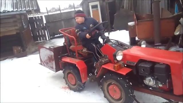 МТЗ 132H с задним навестным ковшом смотреть онлайн
