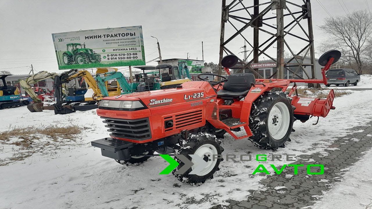 Недорогой функциональный минитрактор для огорода или дачи KUBOTA L1-235 японский китайский трактор смотреть онлайн