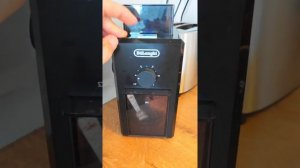 Работа кофемолки жерновной DeLonghi KG 79