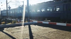 Железнодорожный переезд со шлагбаумом