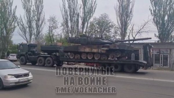 Транспортировка трофейного Leopard 2A6.