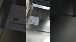 Добавление ополаскивателя в посудомоечную машину