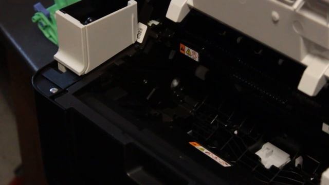 Сброс счетчика МФУ Brother 1512 методом зажатия датчика. смотреть онлайн