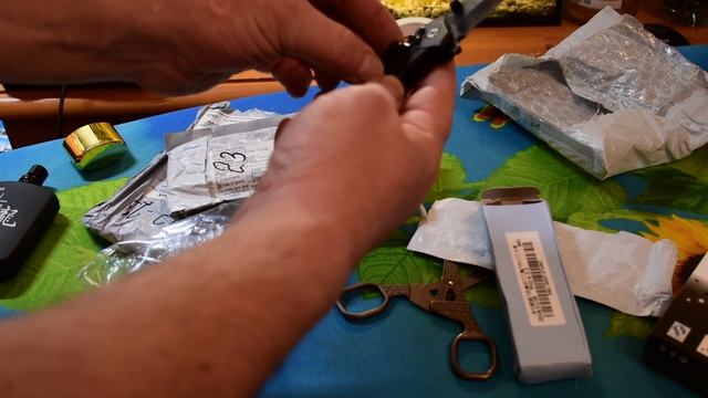 Распаковка посылок из китая. Магазин Пандао (Pandao). Козырный ножик и прочее.