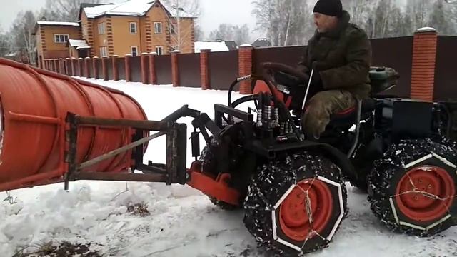 тест-драйв: чистим мокрый снег трактором на гидроходу(2) смотреть онлайн