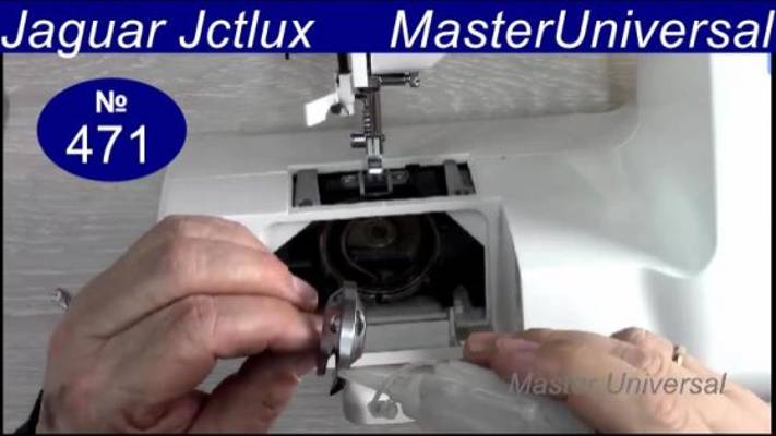 Как смазать челнок, подготовить швейную машину к работе и заправить нитки на  Jaguar. Видео №471.
