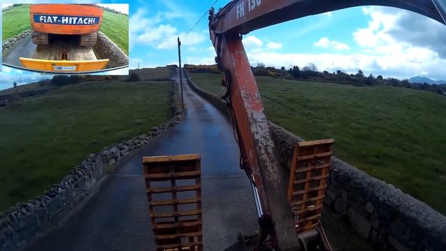 Moving Fiat Hitachi 130 Behind 7610 on Kane Trailer смотреть онлайн
