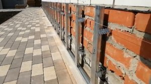 Облицовка цоколя дома фасадными панелями