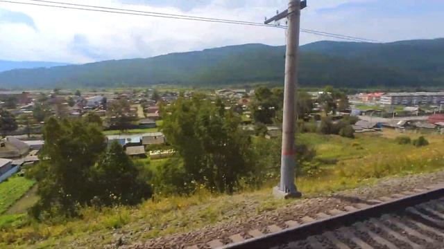 Train trip to Lake Baikal from Irkutsk to Slyudyanka station. View from the train window. Siberia смотреть онлайн