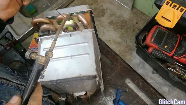 Ремонт тепло-обменника Rinnai EMF смотреть онлайн