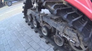 Центральный подрессоренный каток на японском гусеничном минитракторе Yanmar AC 18