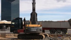 Volvo EC360B Excavator Loading Trucks