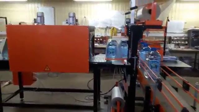 Автоматическая термоупаковочная машина ТМ 1А. Упаковка бутылок 5л по 2шт. смотреть онлайн