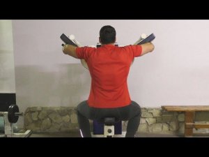 Махи руками в стороны в тренажёре: техника и нюансы
