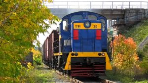 "Промтранспорт". ТГМ4-3121 с грузовым составом