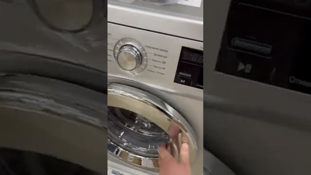 Стиральная машина LG в сером цвете с хромированным люком 7кг. смотреть онлайн