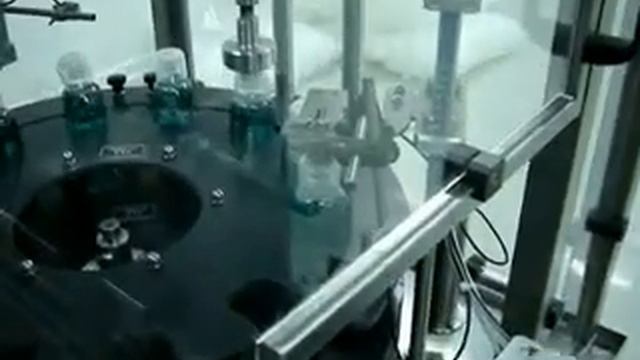 Omni Projekt - masine za pakovanje - Automatska linija za punjenje sampona.avi смотреть онлайн