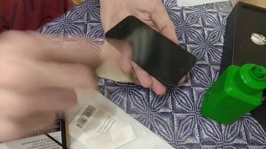 Повторная клейка защитного стекла на телефон