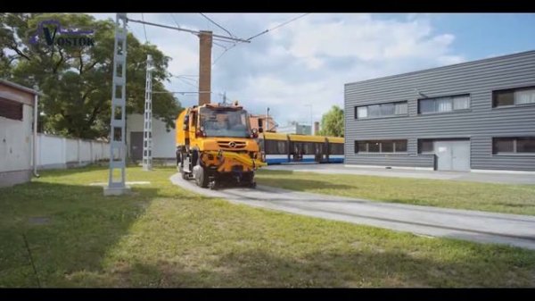 №1. Локомобиль Unimog U400. Навеска: пылесос вакуумный и КМУ.