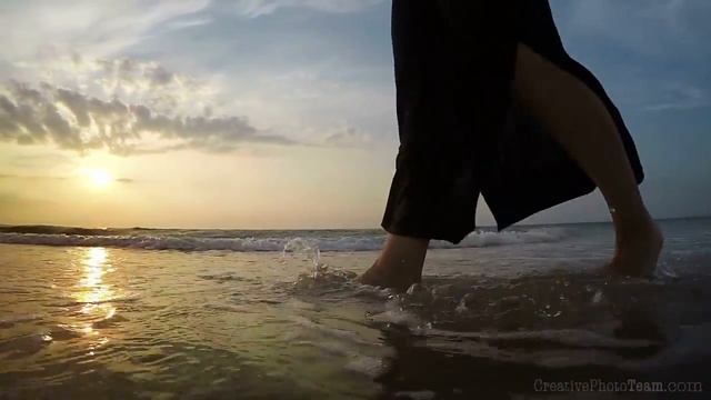 Barefoot legs of young female walking on the sunset beach, Biruchiy island,Ukraine смотреть онлайн