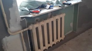 как штукатурить за батареями