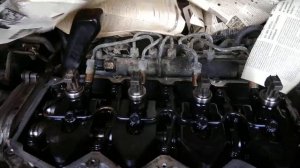 Прогоревшая прокладка под форсункой.