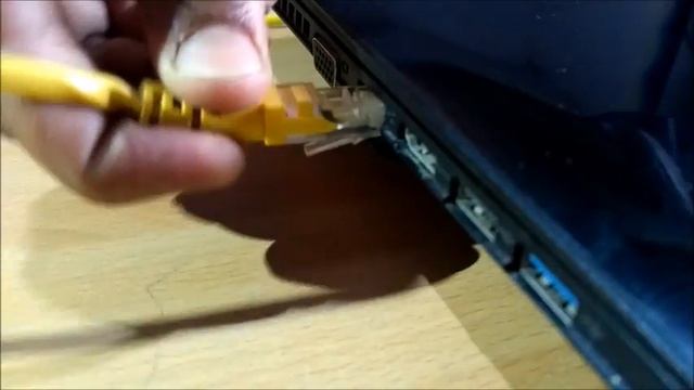 HOW TO REMOVE ETHERNET CABLE FROM LAPTOP