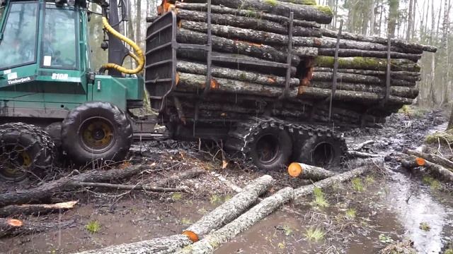 Timberjack 810B in wet forest, difficult logging conditions смотреть онлайн