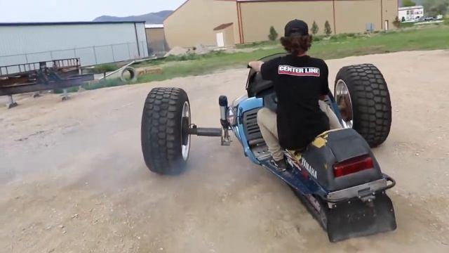 Cнегоход Yamaha на больших колесах. Русский перевод. Snowmobile on HUGE truck wheels! смотреть онлайн