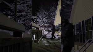 Greenworks Commercial 82SN22 snowblower with wet heavy snow on the deck. 82v Battery powered