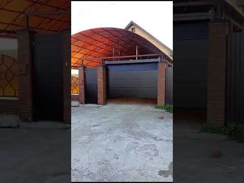 Ворота АЛЮТЕХ гаражные с автоматикой, панели L-гофр, цвет Шоколад RAL8017 смотреть онлайн