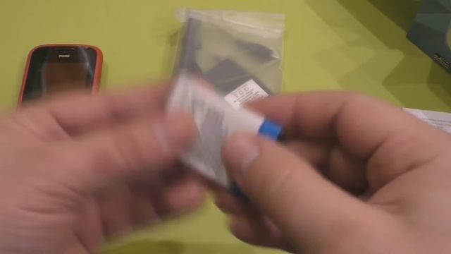 Распаковка мобильный телефон Nomi i177 red | Unpacking mobile phone Nomi i177 red смотреть онлайн