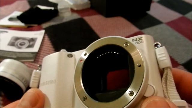 Распаковка и внешний вид фотоаппарата Samsung NX 1000 смотреть онлайн