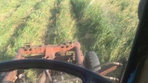 Т-16 продолжает косит роторной косилкой Виракс 1,25