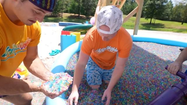 BIGGEST Backyard Water Slide With 100 MILLION ORBEEZ! смотреть онлайн