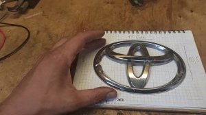 Значок тойота. Шильдик тойота. Эмблема тойота.